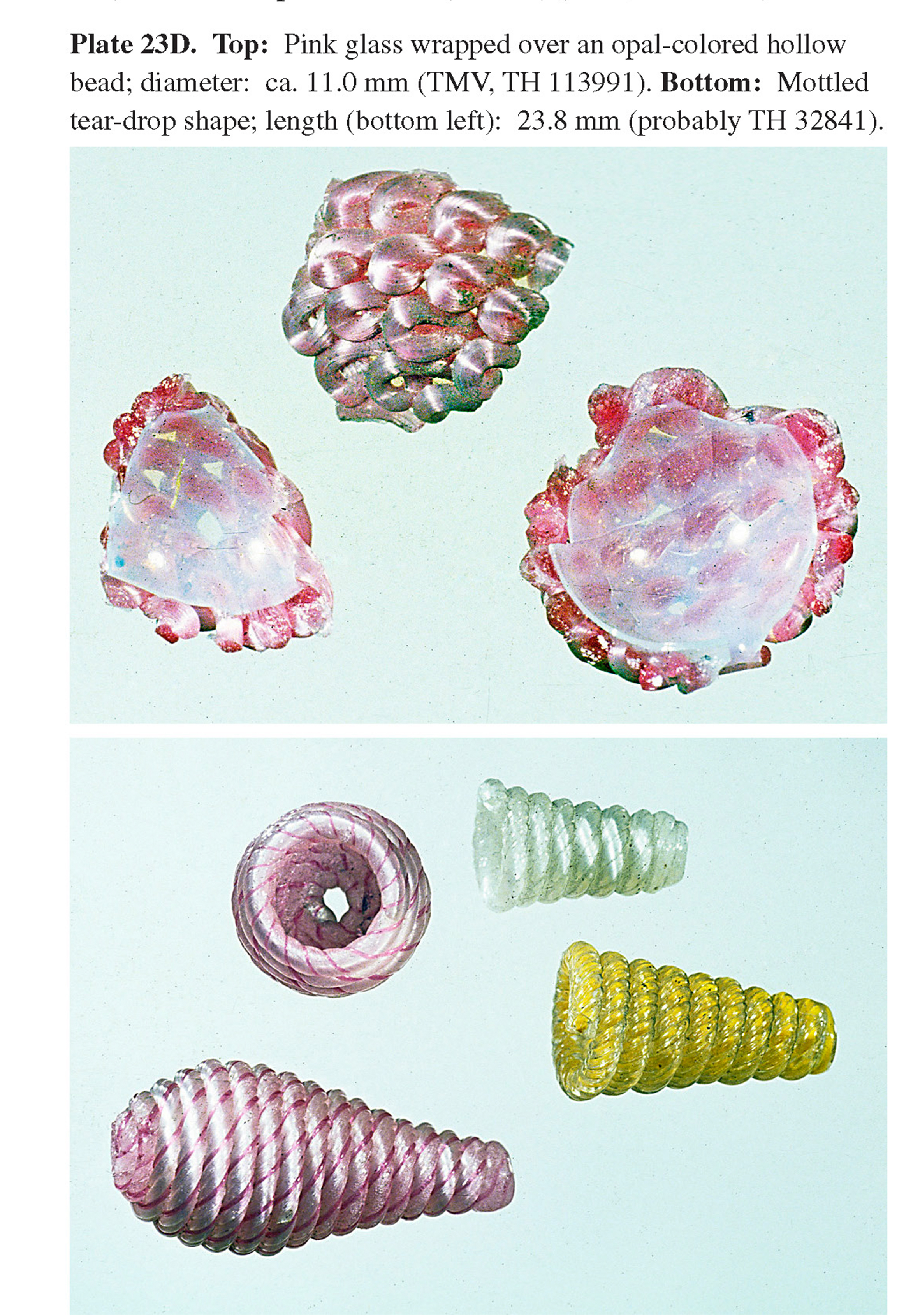 Plate 23D Top: Pink glass wrapped over an opal-colored hollow bead; diameter: ca. 11.0 mm (TMV, TH 113991). Bottom: Mottled tear-drop shape; length (bottom left): 23.8 mm (probably TH 32841).